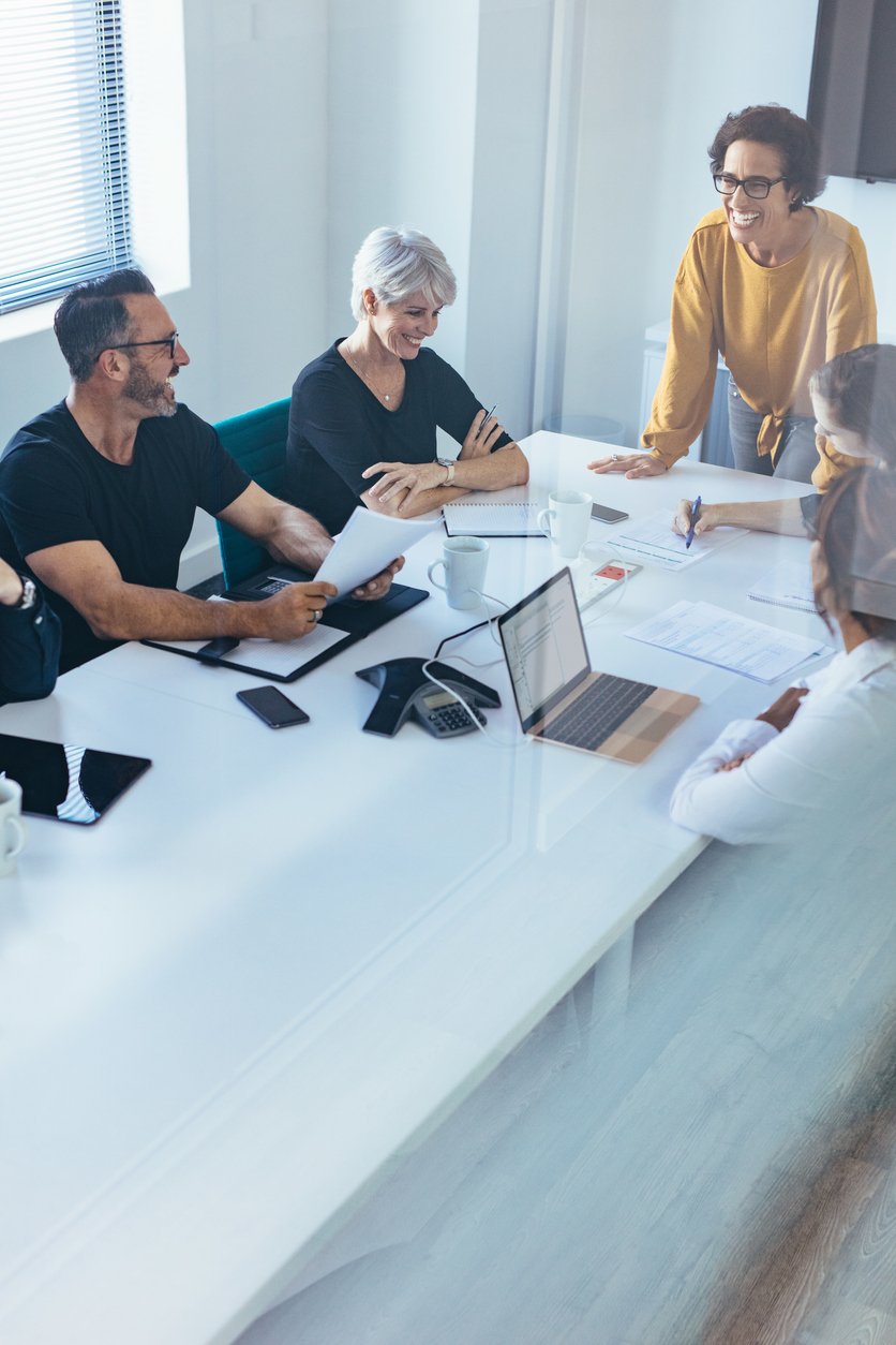 Modern office workers in a corporate giving brainstorming session